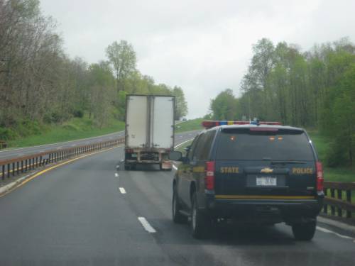 State Trooper Following a Truck